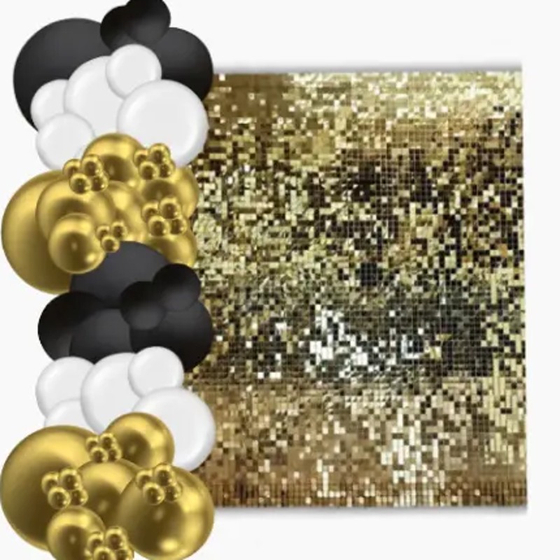 Gold shimmer wall with black, white and gold balloon garland