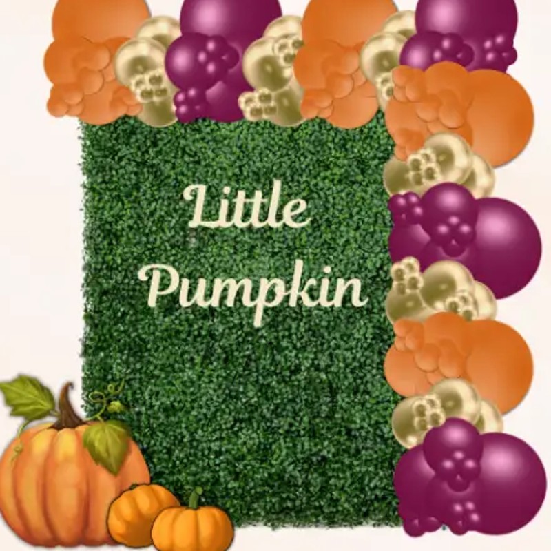 Fall boxwood wall backdrop with orange, plum and gold balloons