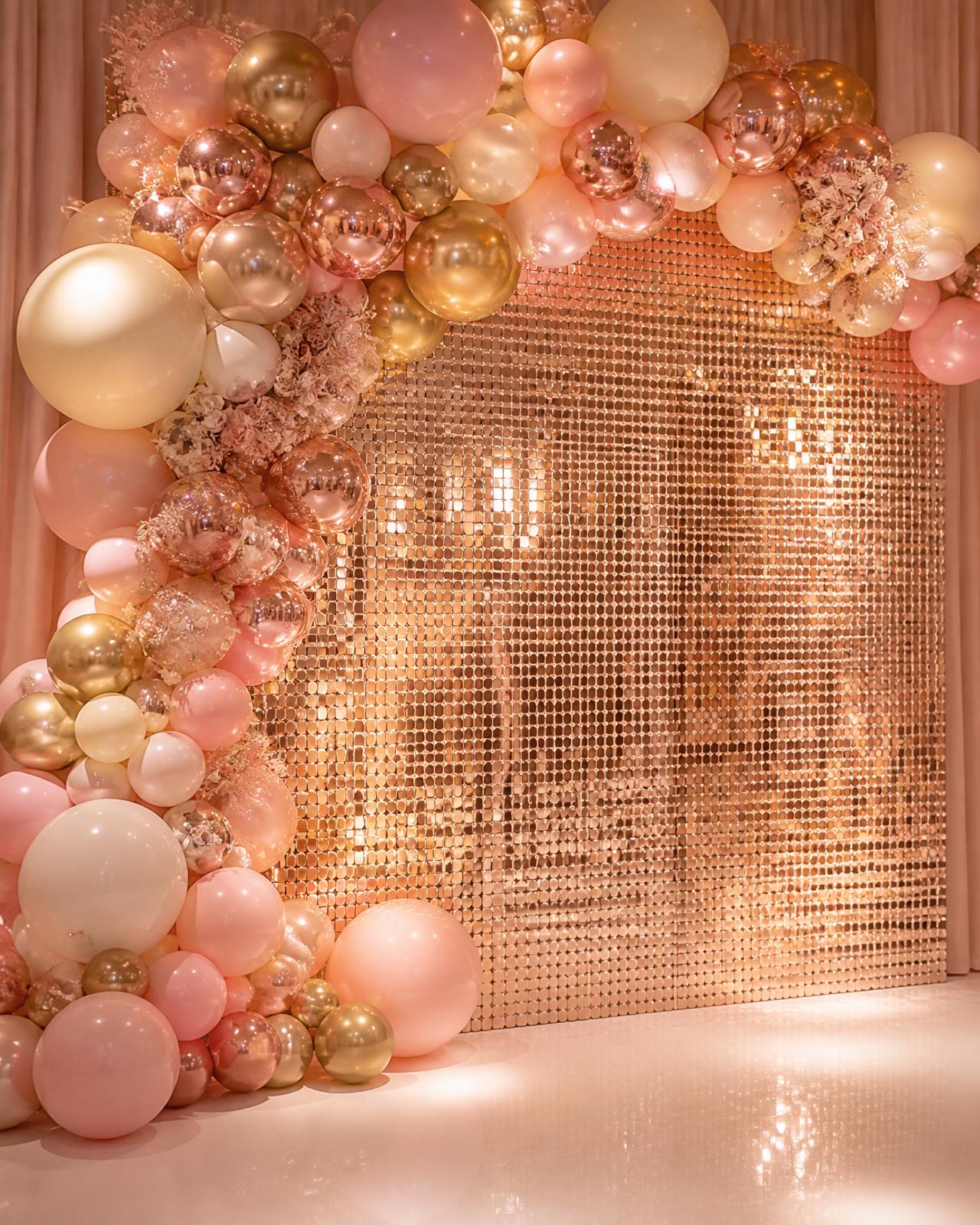 Luxury shimmer wall backdrop with cascading blush and gold balloon garland by Simone's Creations DMV